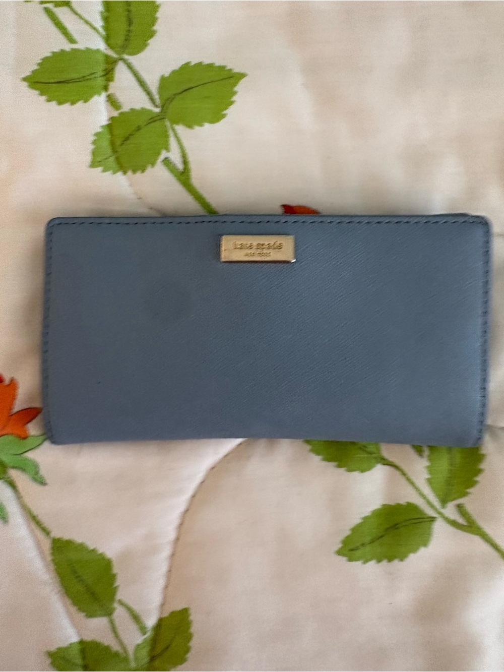kate spade light blue zip-around saffiano wallet